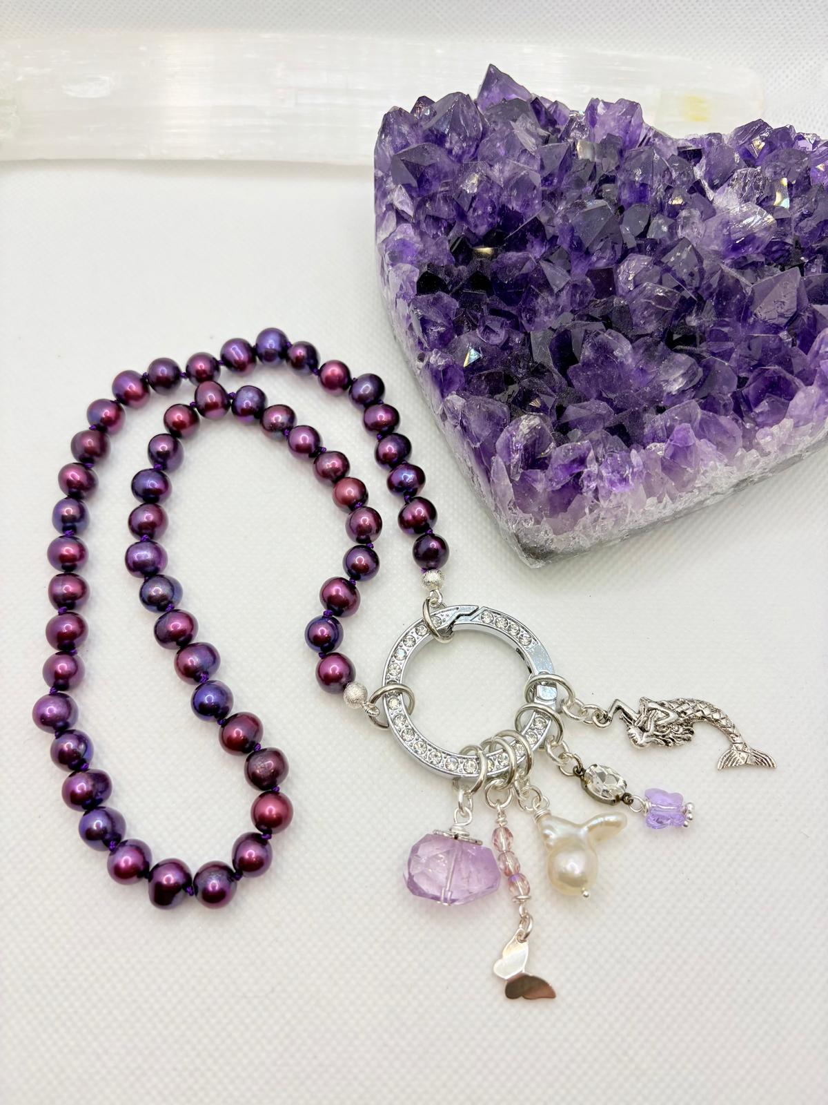 Deep plum freshwater pearl necklace with crystal-set clasp and charms